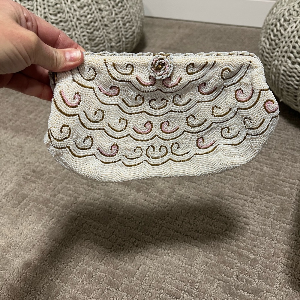 Vintage beaded clutch with intricate with gold and pink detail!